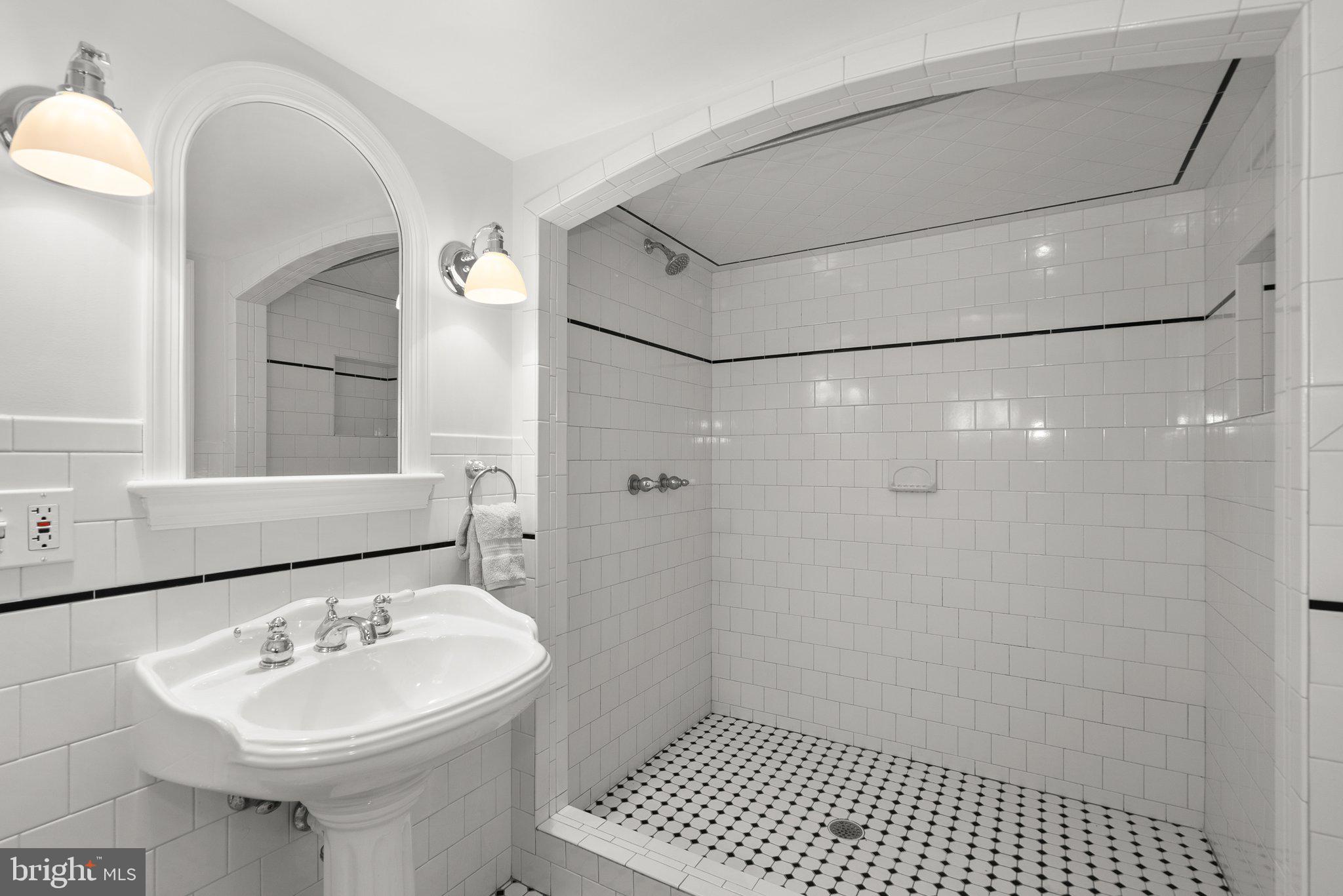 10210 Pierce Drive Silver Spring, MD 20901 - Photo 39 of 49 a bathroom with a sink a toilet and shower