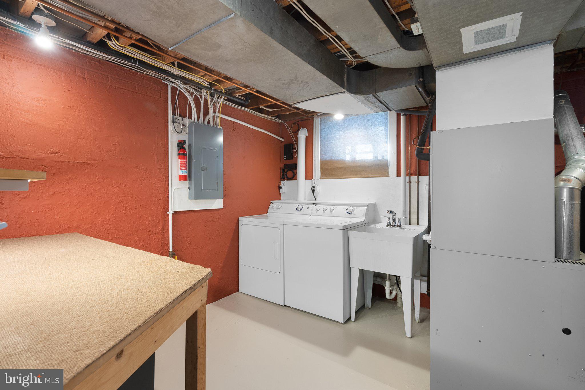 10210 Pierce Drive Silver Spring, MD 20901 - Photo 40 of 49 a utility room with dryer and washer