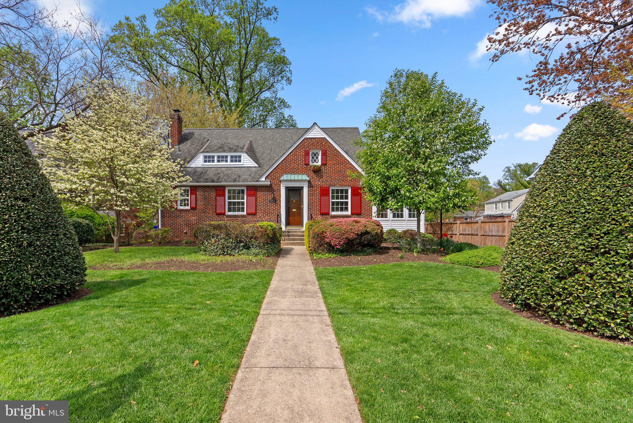 10210 Pierce Drive Silver Spring, MD 20901 - Photo 49 of 49 a front view of a house with a yard