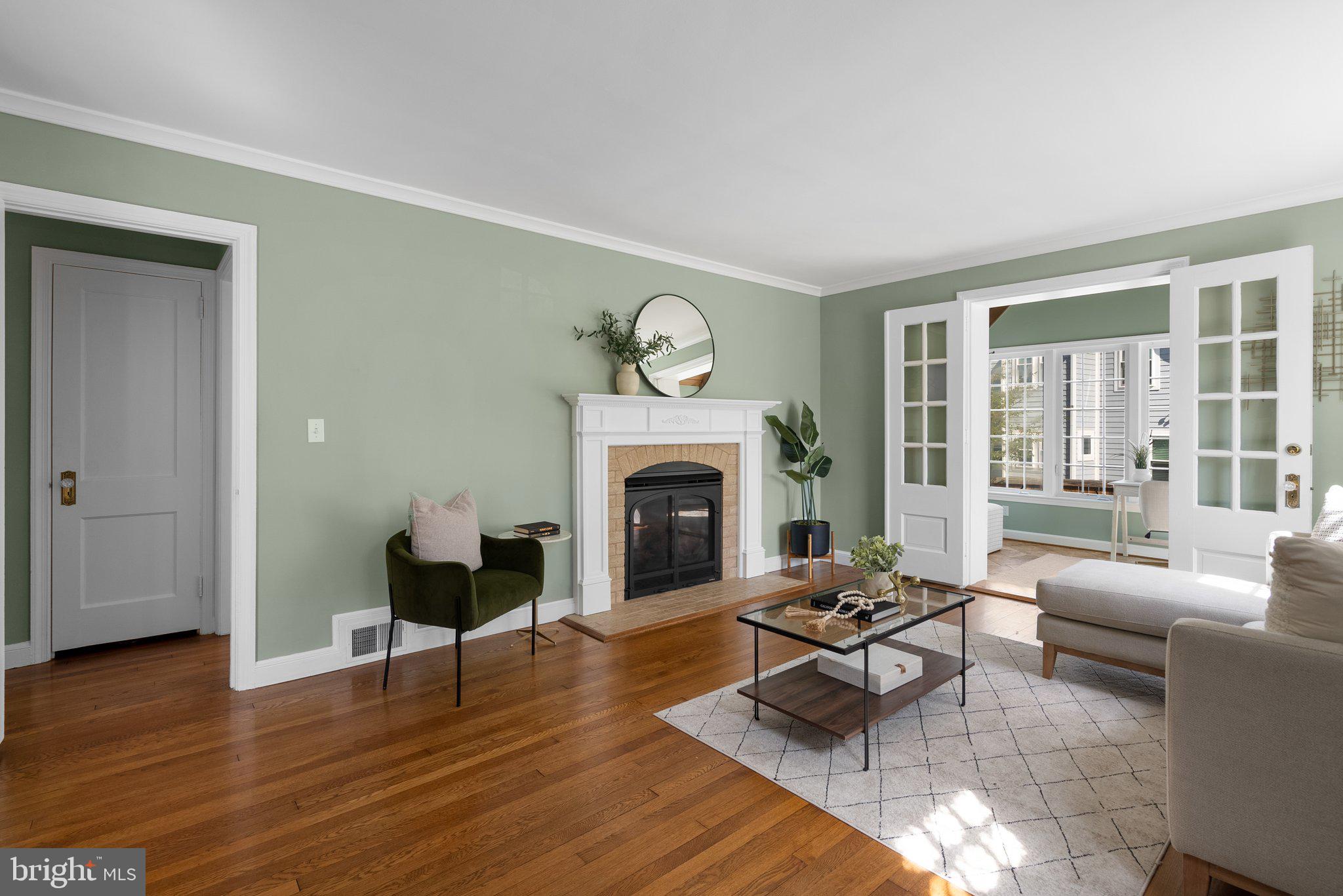 10210 Pierce Drive Silver Spring, MD 20901 - Photo 6 of 49 a living room with furniture and a fireplace