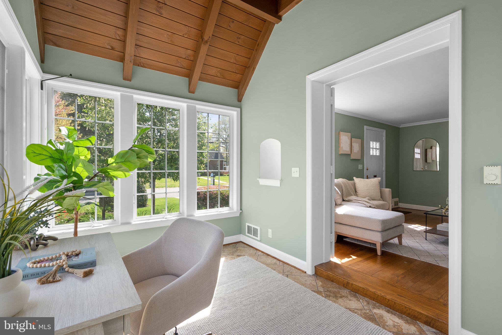 10210 Pierce Drive Silver Spring, MD 20901 - Photo 10 of 49 a living room with furniture and a large window