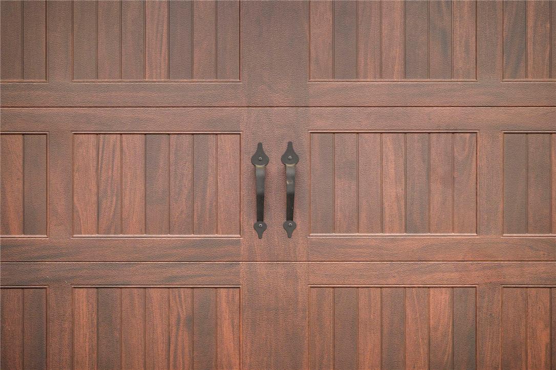 Hottle Road Quakertown, PA 18951 - Photo 55 of 59 Rich wood grain textures and classic hardware define this carriage-style garage door design.