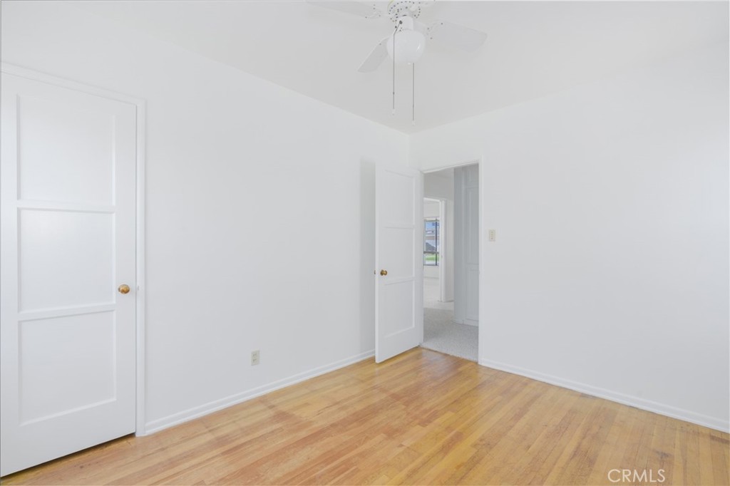 13792 Figueroa Street Garden Grove, CA 92843 - Photo 26 of 38 a view of empty room with wooden floor