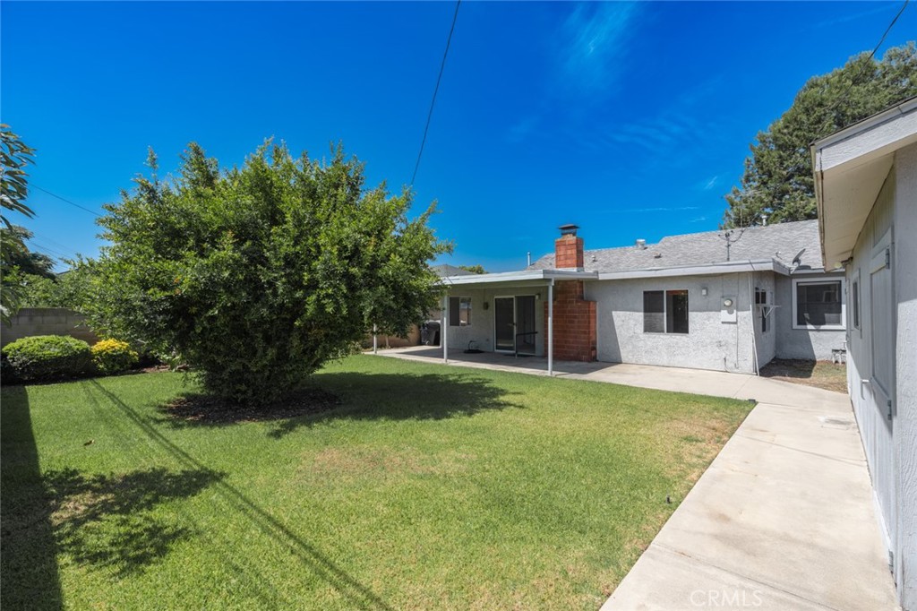 13792 Figueroa Street Garden Grove, CA 92843 - Photo 28 of 38 a front view of a house with a garden