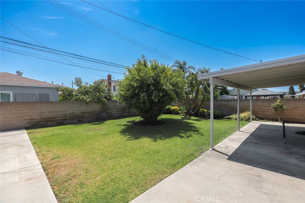 13792 Figueroa Street Garden Grove, CA 92843 - Photo 30 of 38 a view of a backyard house with a patio