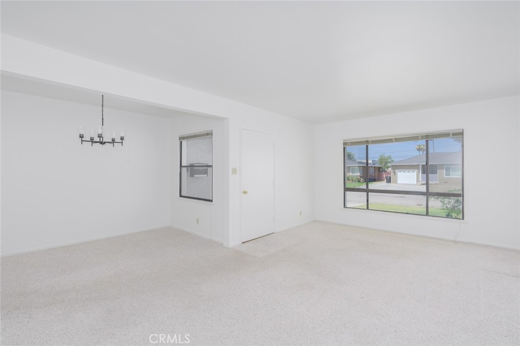 13792 Figueroa Street Garden Grove, CA 92843 - Photo 3 of 38 an empty room with windows