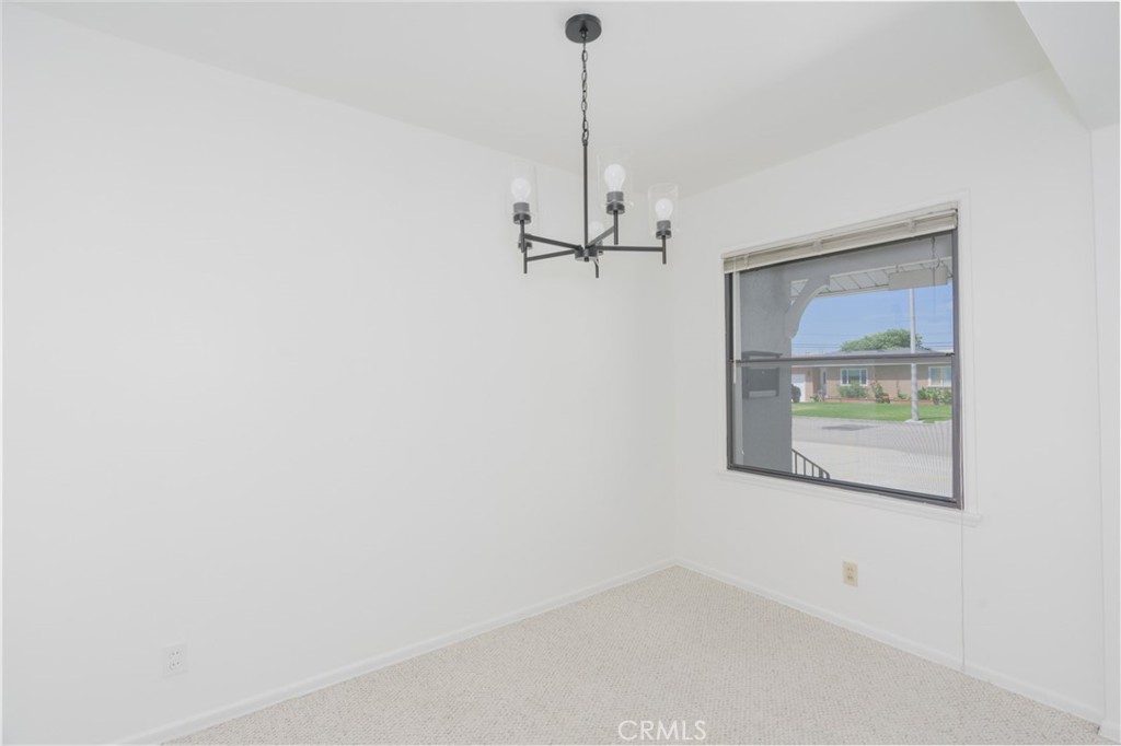 13792 Figueroa Street Garden Grove, CA 92843 - Photo 6 of 38 an empty room with a window