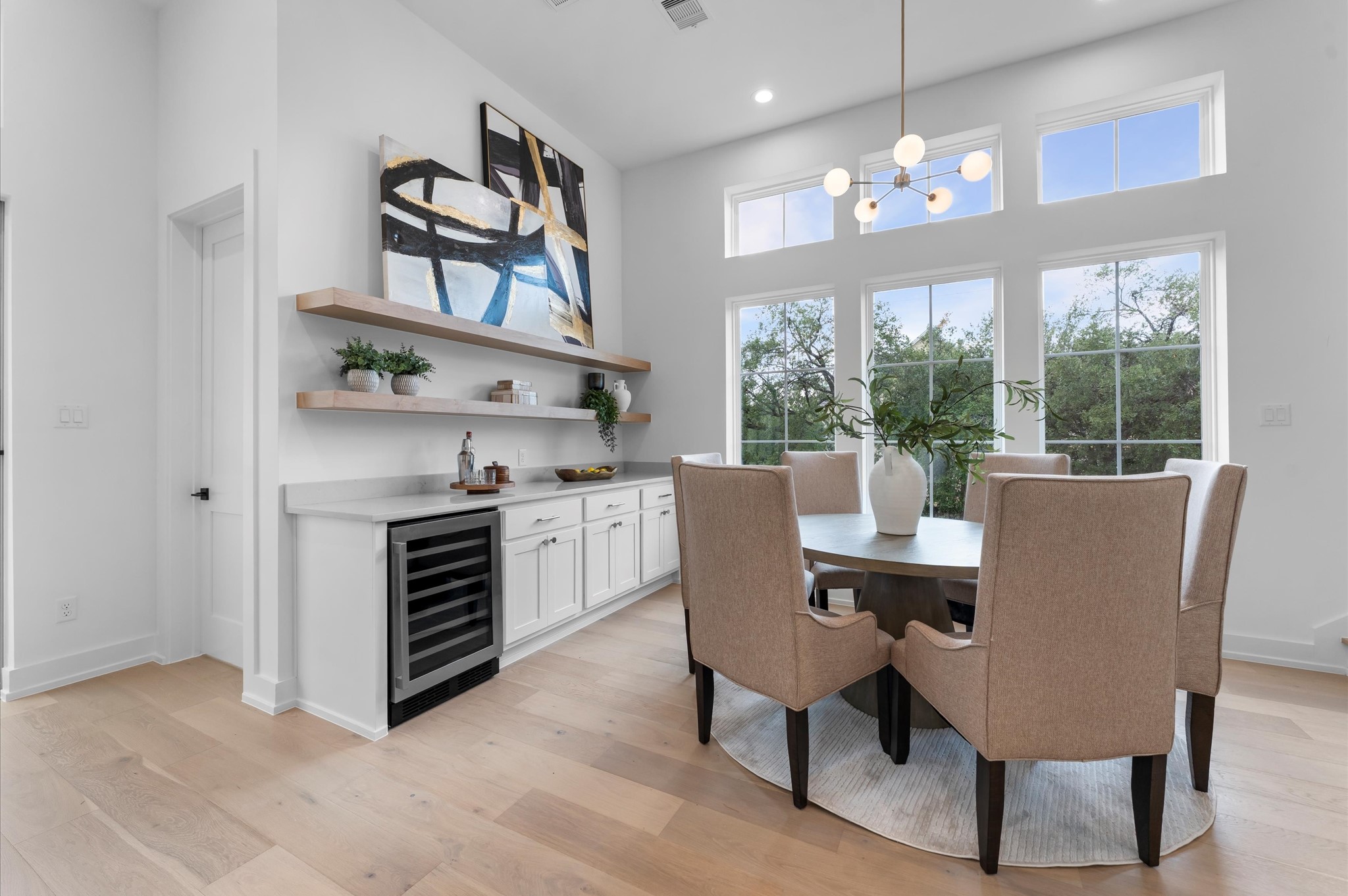 2916 Michaux Street Houston, TX 77009 - Photo 6 of 41 Second floor dining area features a bar with open shelves, wind fridge and plenty of storage.