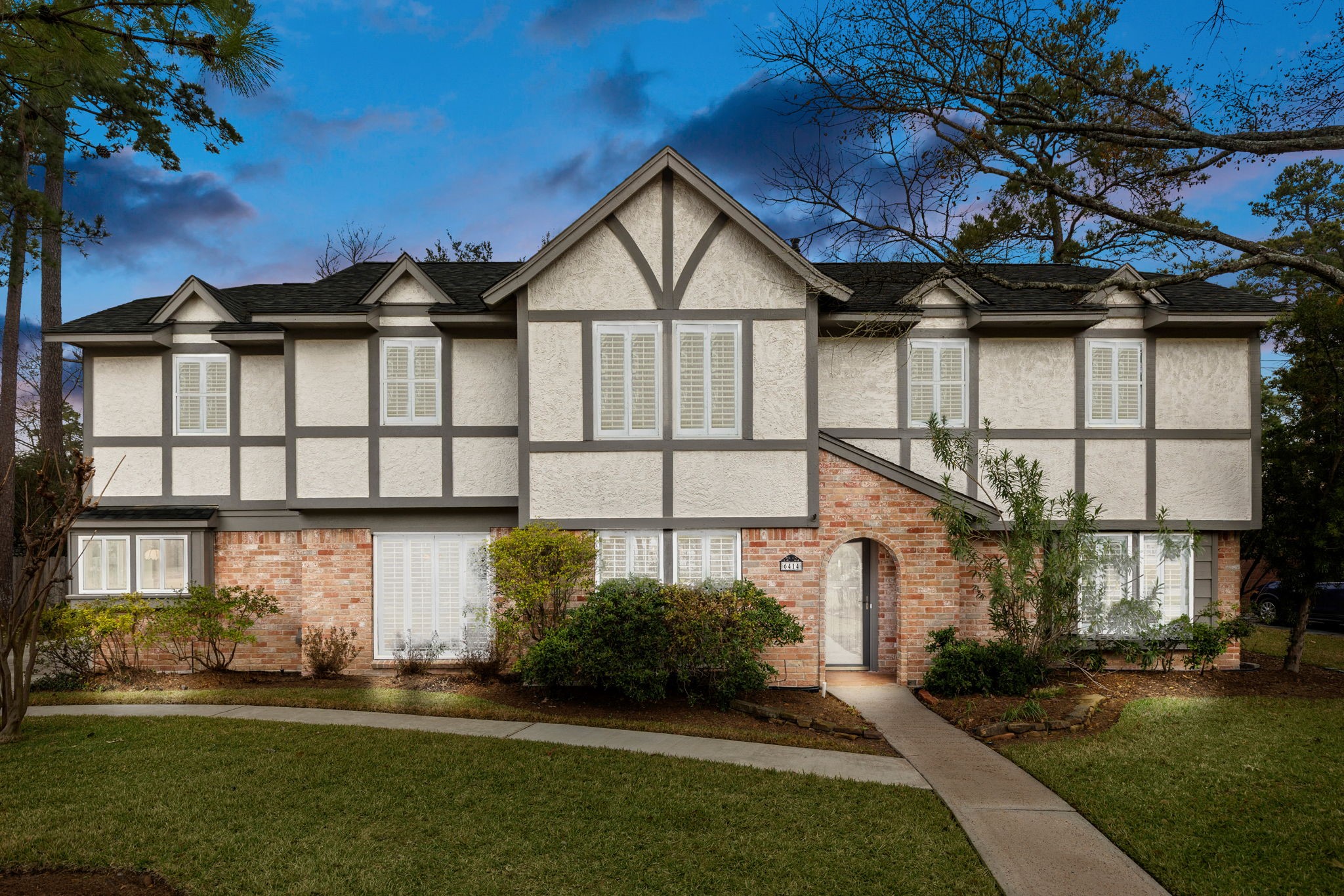 6414 Hickorycrest Drive Spring, TX 77389 - Photo 1 of 49 a front view of a house with a yard