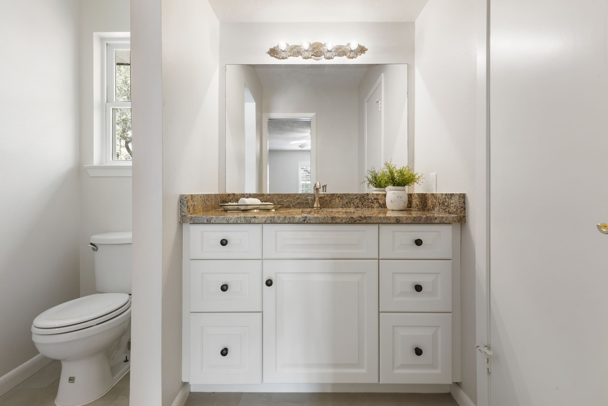 6414 Hickorycrest Drive Spring, TX 77389 - Photo 28 of 49 a bathroom with a sink and a mirror