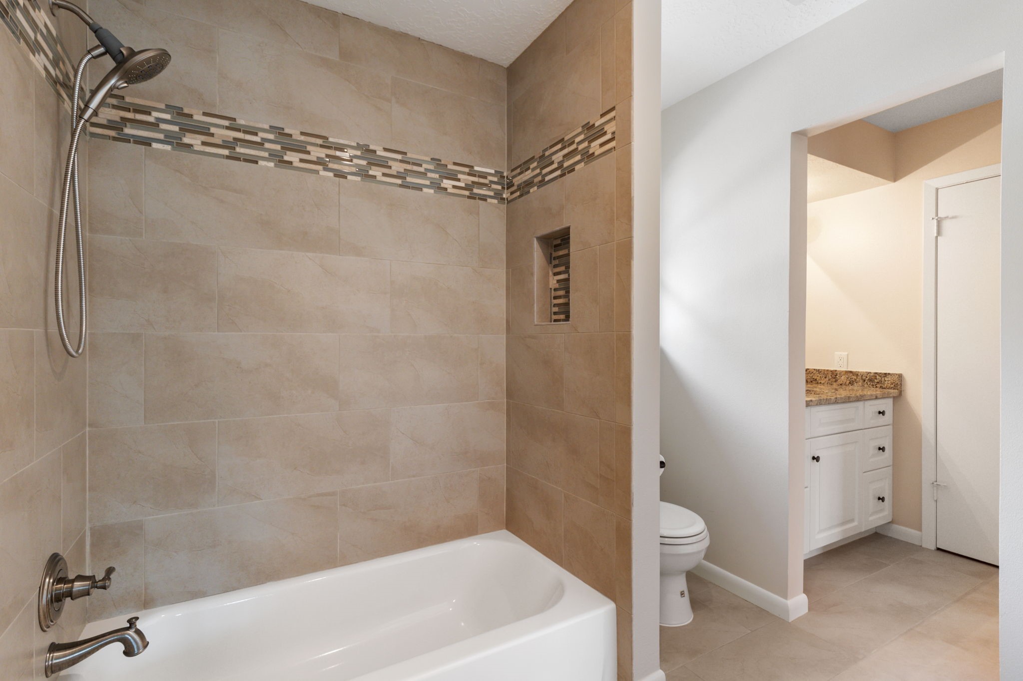 6414 Hickorycrest Drive Spring, TX 77389 - Photo 29 of 49 a bathroom with a sink a toilet and shower