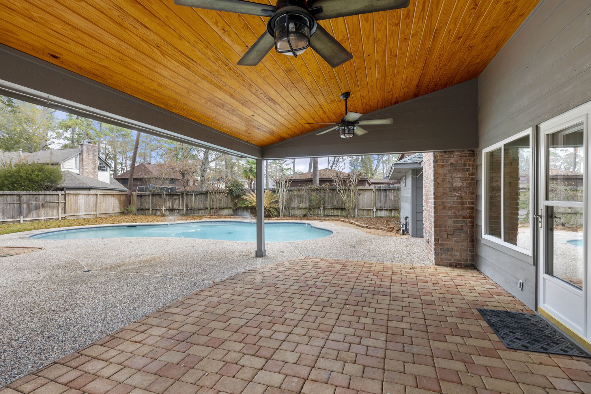 6414 Hickorycrest Drive Spring, TX 77389 - Photo 35 of 49 a view of an empty room with a floor to ceiling window