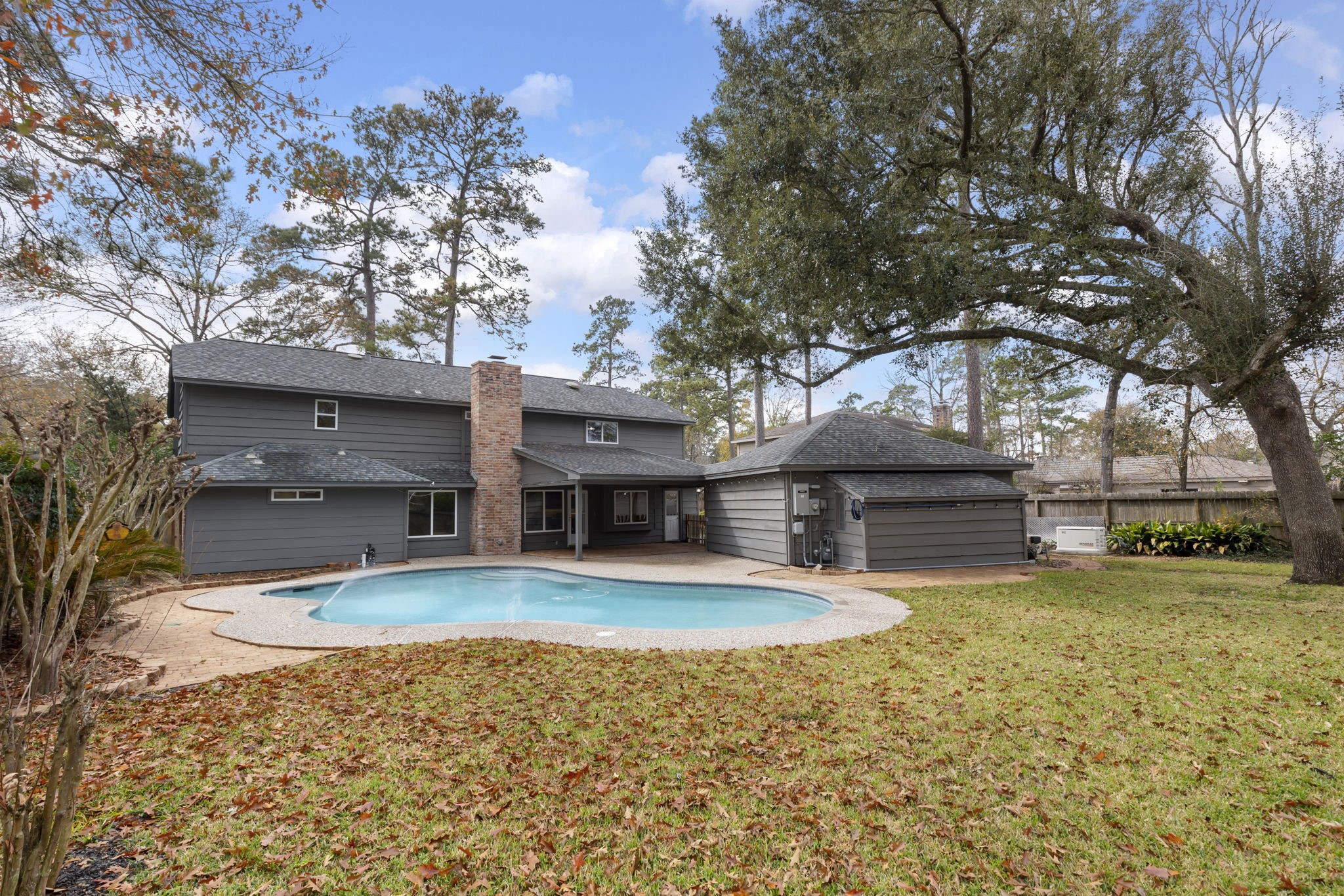 6414 Hickorycrest Drive Spring, TX 77389 - Photo 40 of 49 a view of a house with swimming pool and sitting area