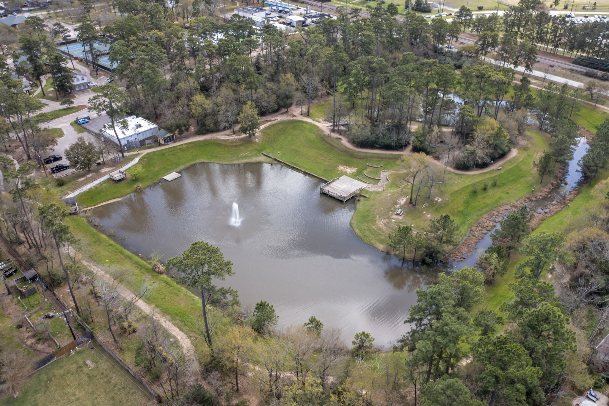 6414 Hickorycrest Drive Spring, TX 77389 - Photo 48 of 49 an aerial view of a house with a yard and lake view