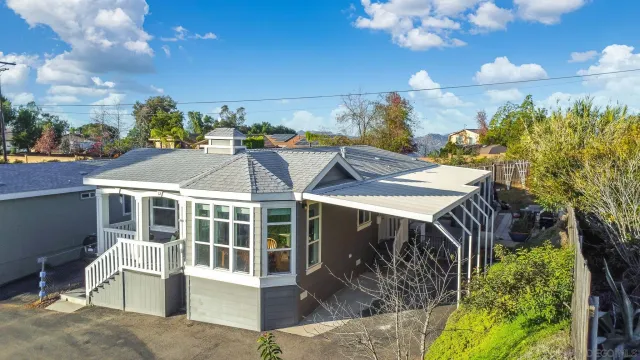a view of a patio with swimming pool table and chairs