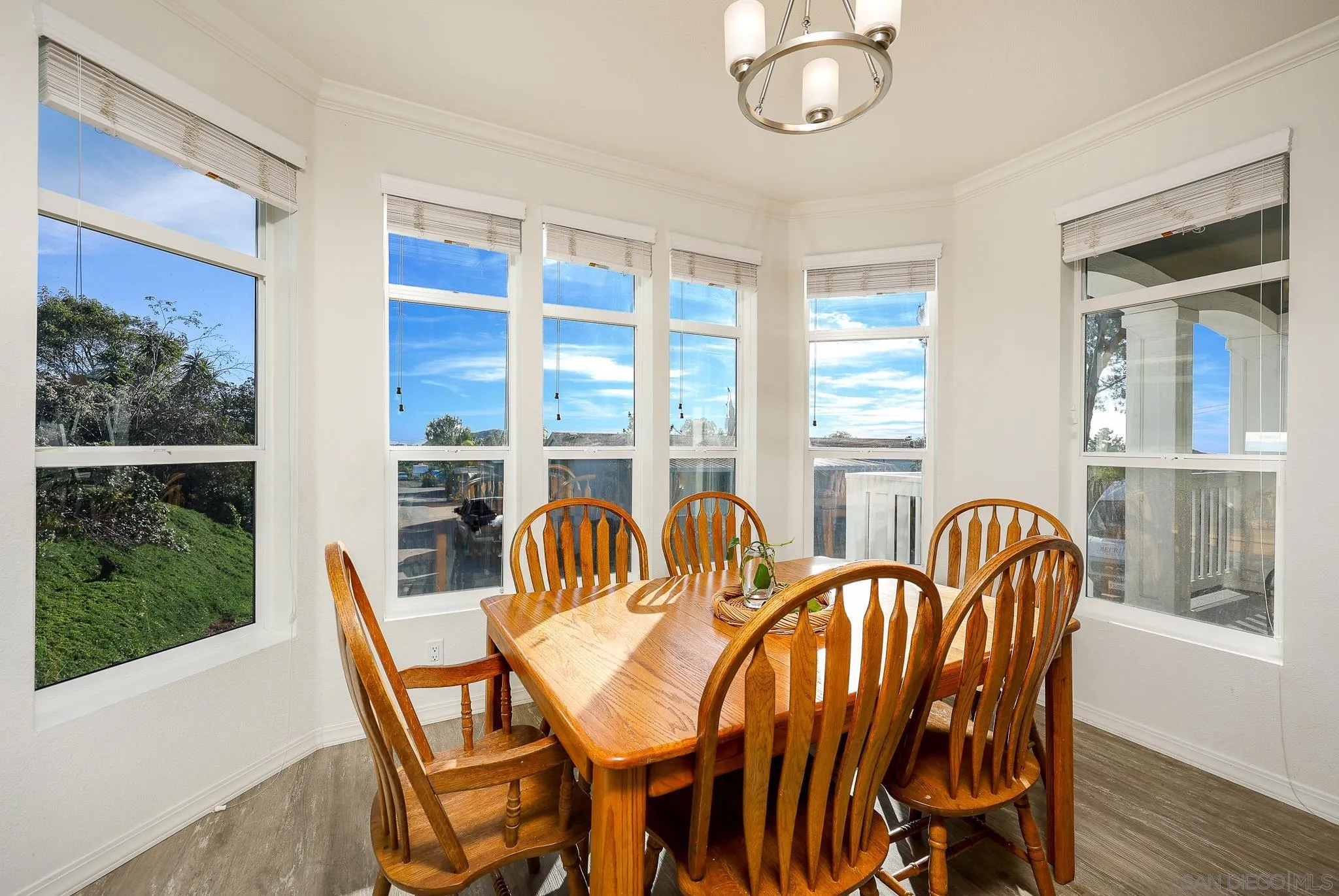 250 La Cresta Heights Road, Unit SPC 12 El Cajon, CA 92021 - Photo 27 of 36 a view of a dining room with furniture wooden floor and windows