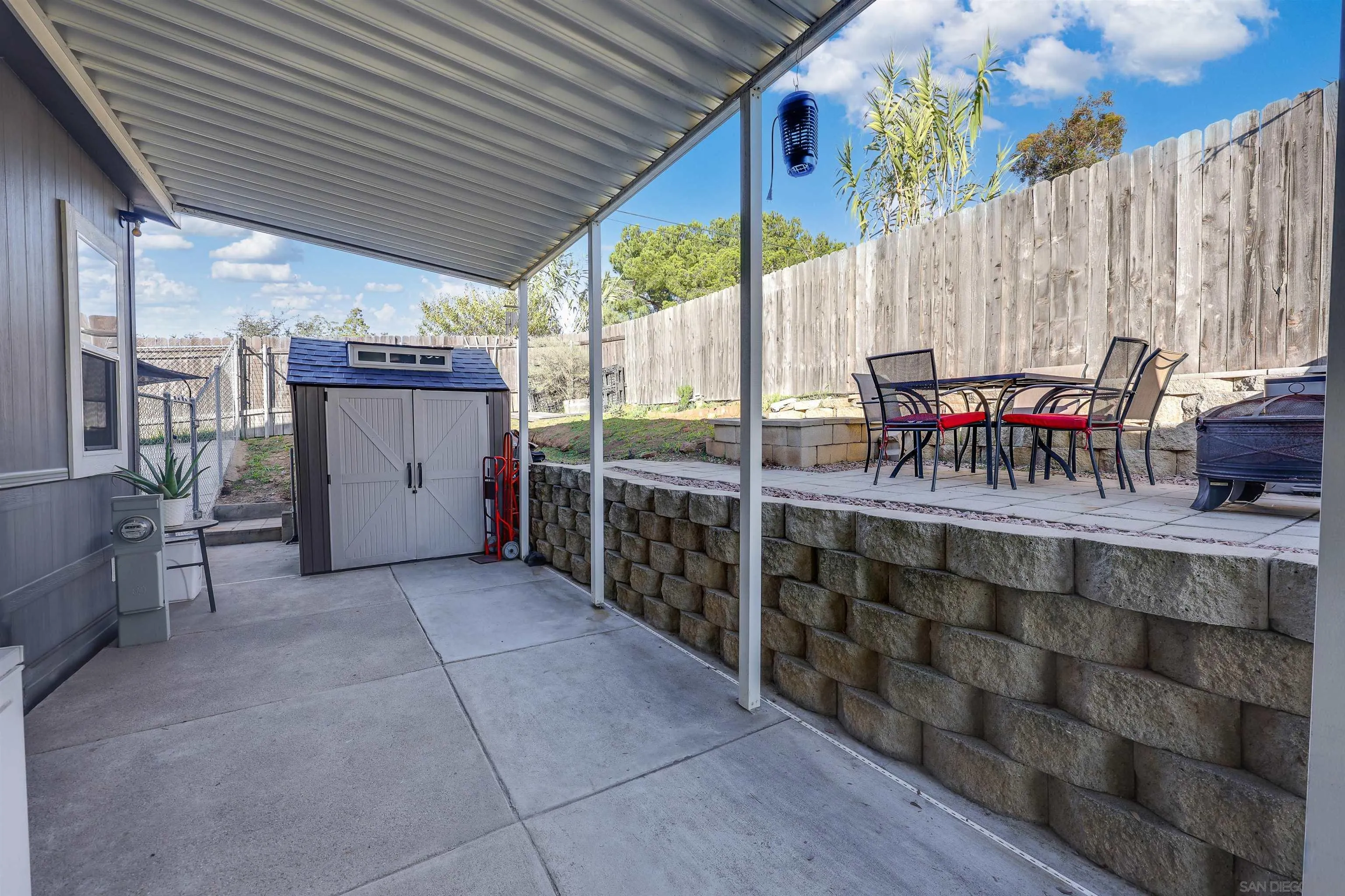 250 La Cresta Heights Road, Unit SPC 12 El Cajon, CA 92021 - Photo 32 of 36 a view of a shaded area in a patio