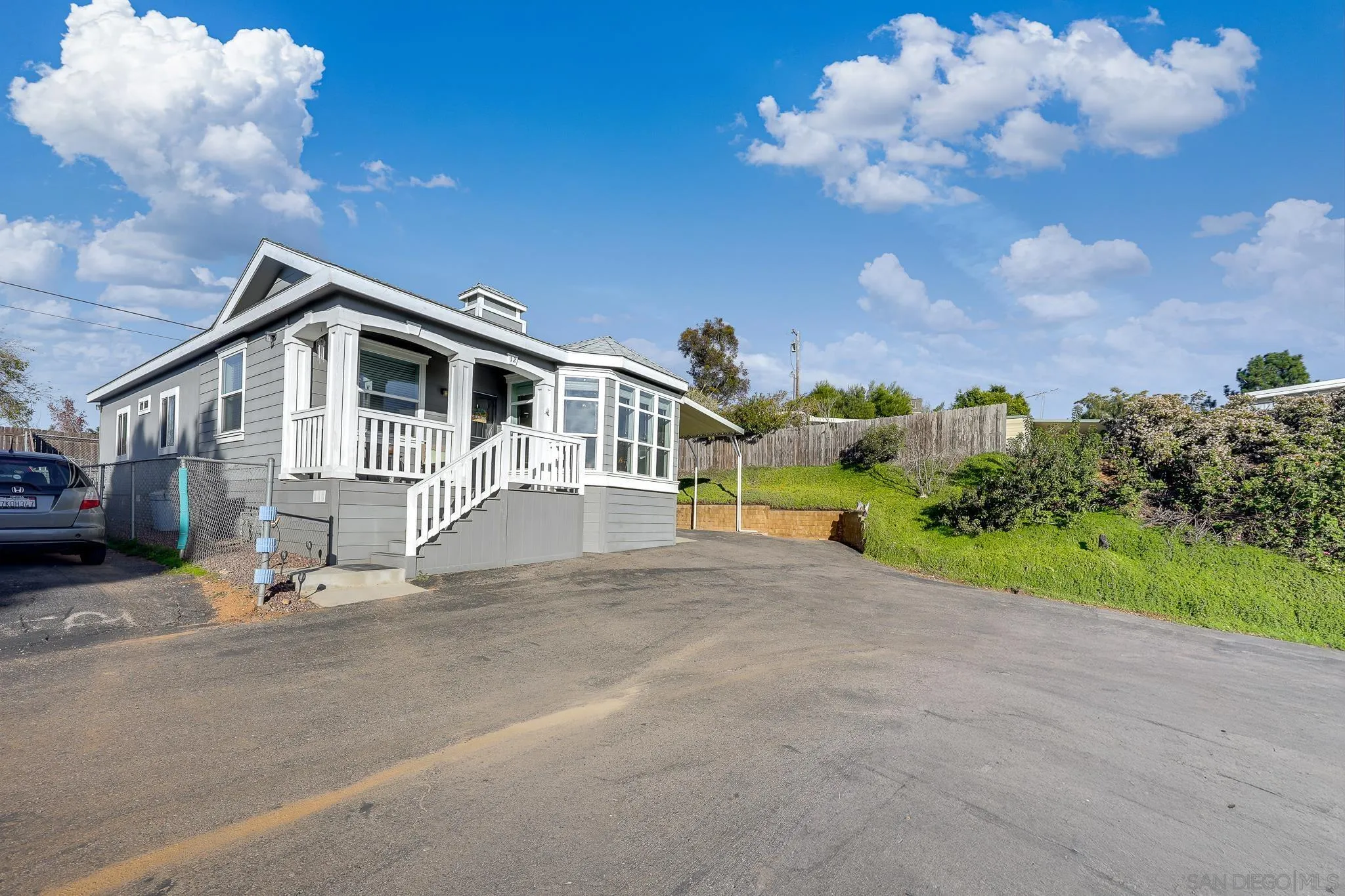 250 La Cresta Heights Road, Unit SPC 12 El Cajon, CA 92021 - Photo 33 of 36 a front view of a house with a garden