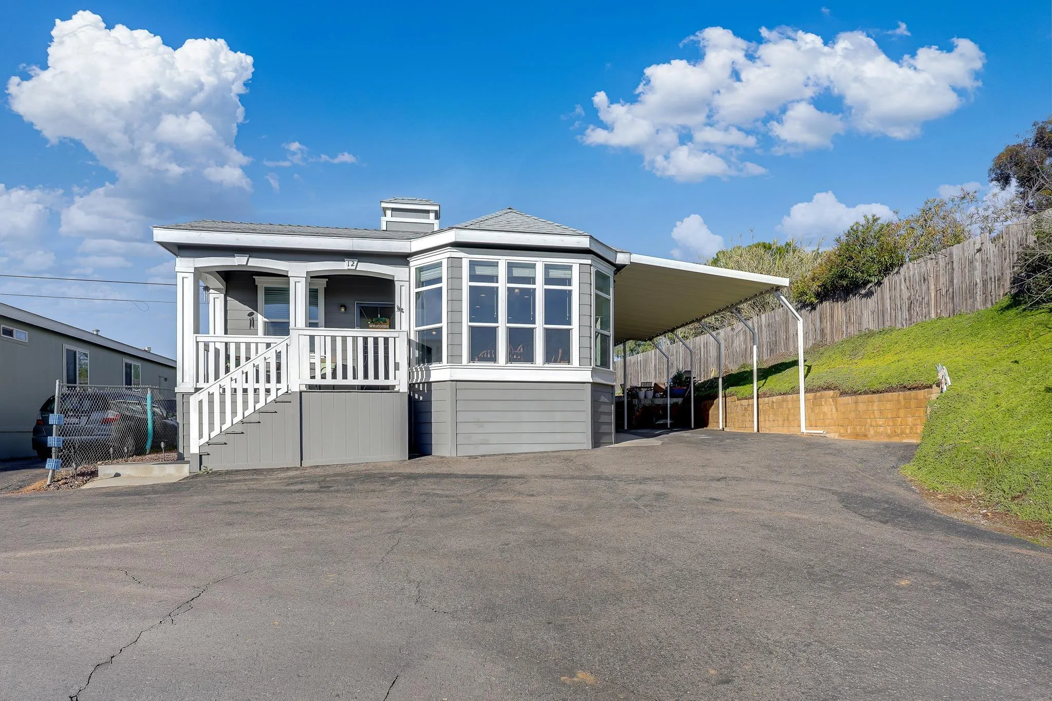 250 La Cresta Heights Road, Unit SPC 12 El Cajon, CA 92021 - Photo 7 of 36 a view of a house with a outdoor space