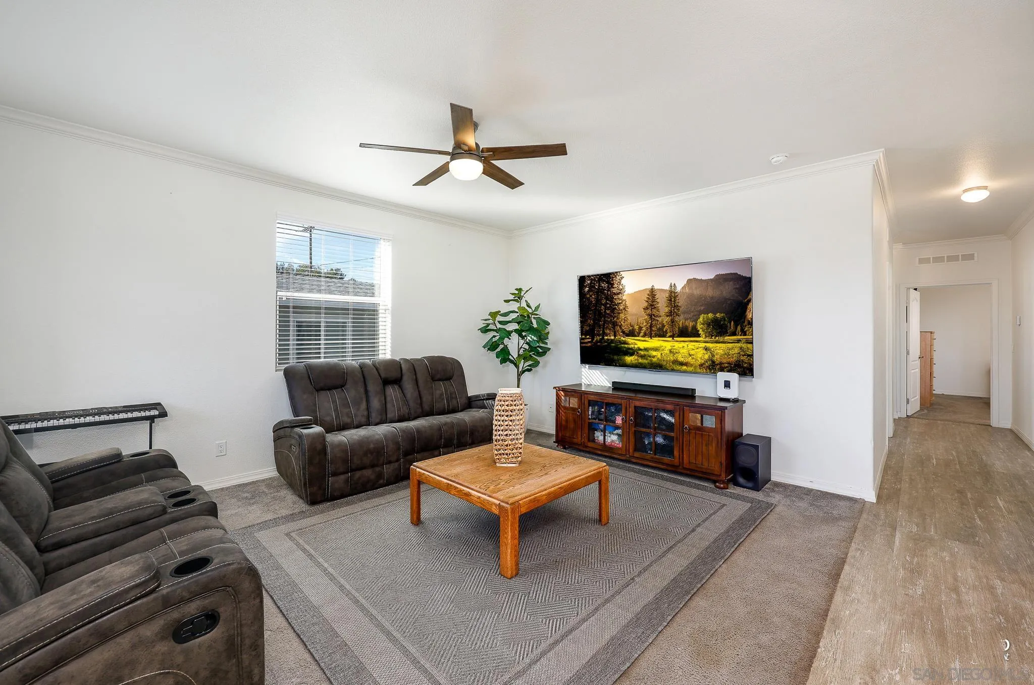 250 La Cresta Heights Road, Unit SPC 12 El Cajon, CA 92021 - Photo 8 of 36 a living room with furniture and a flat screen tv