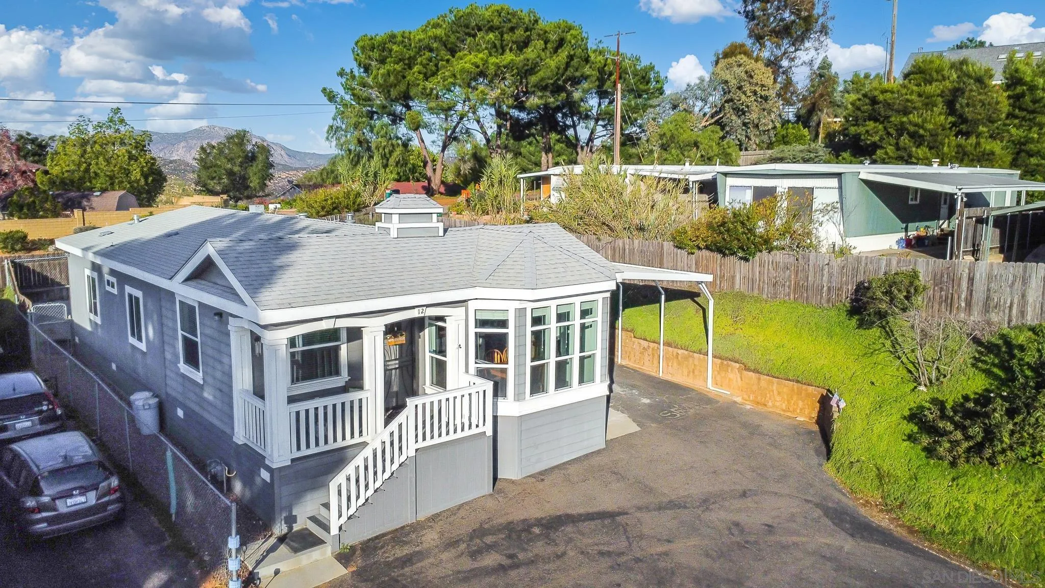 250 La Cresta Heights Road, Unit SPC 12 El Cajon, CA 92021 - Photo 10 of 36 a view of a house with roof deck and sitting area