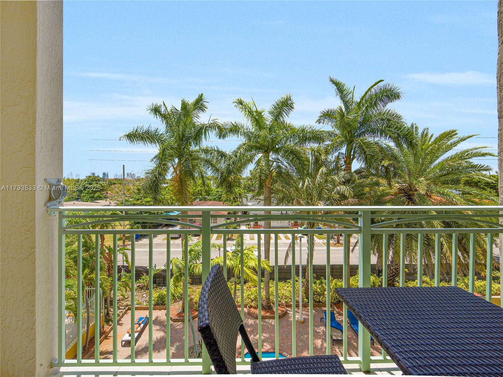 a view of a balcony with lake view and a ocean view