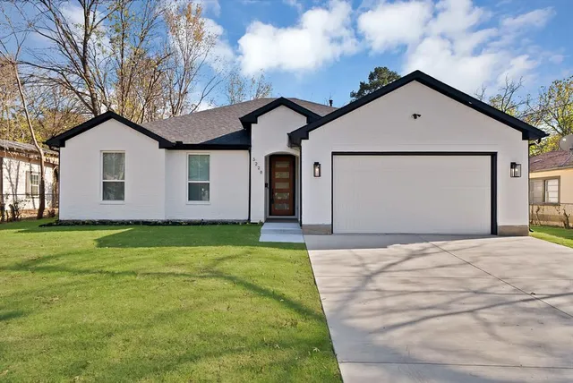 a front view of house with yard