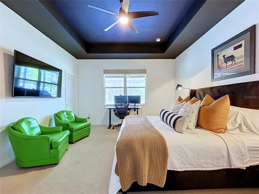 18078 Romanesque Court Spring Hill, FL 34610 - Photo 28 of 81 a bedroom with a bed mirror and window