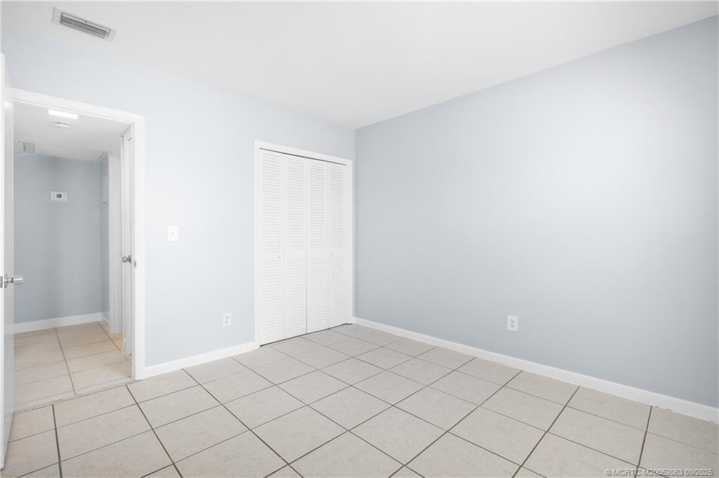 333 Southeast Martin Avenue, Unit 1A Stuart, FL 34996 - Photo 13 of 23 a view of an empty room