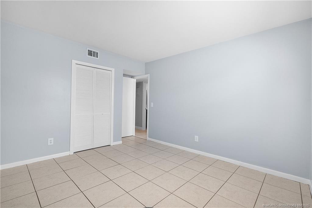 333 Southeast Martin Avenue, Unit 1A Stuart, FL 34996 - Photo 15 of 23 a view of an empty room