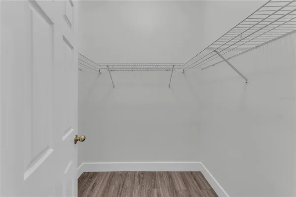 a view of a room with racks on the wall