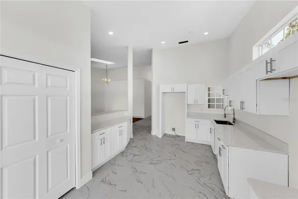 a bathroom with a sink and mirror