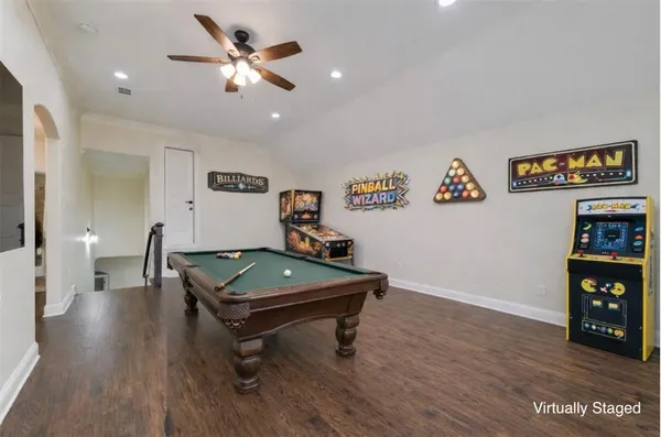 a room with furniture and wooden floor