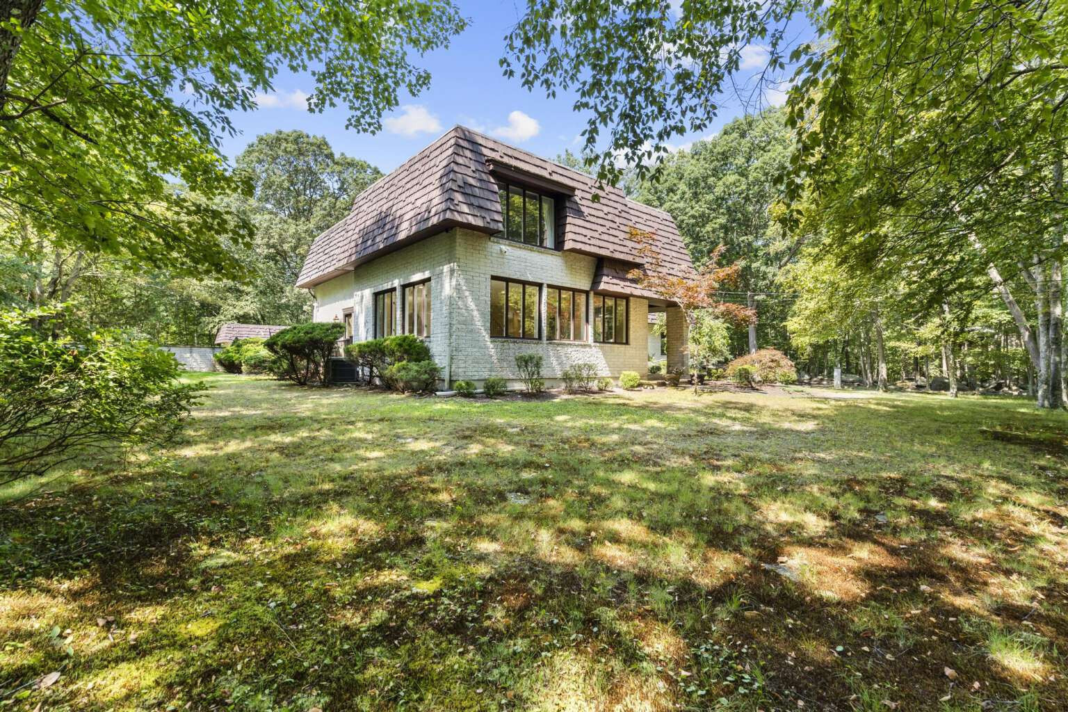 40 Old Quarry Road Woodbridge, CT 06525 - Photo 2 of 39 a front view of house with yard and green space