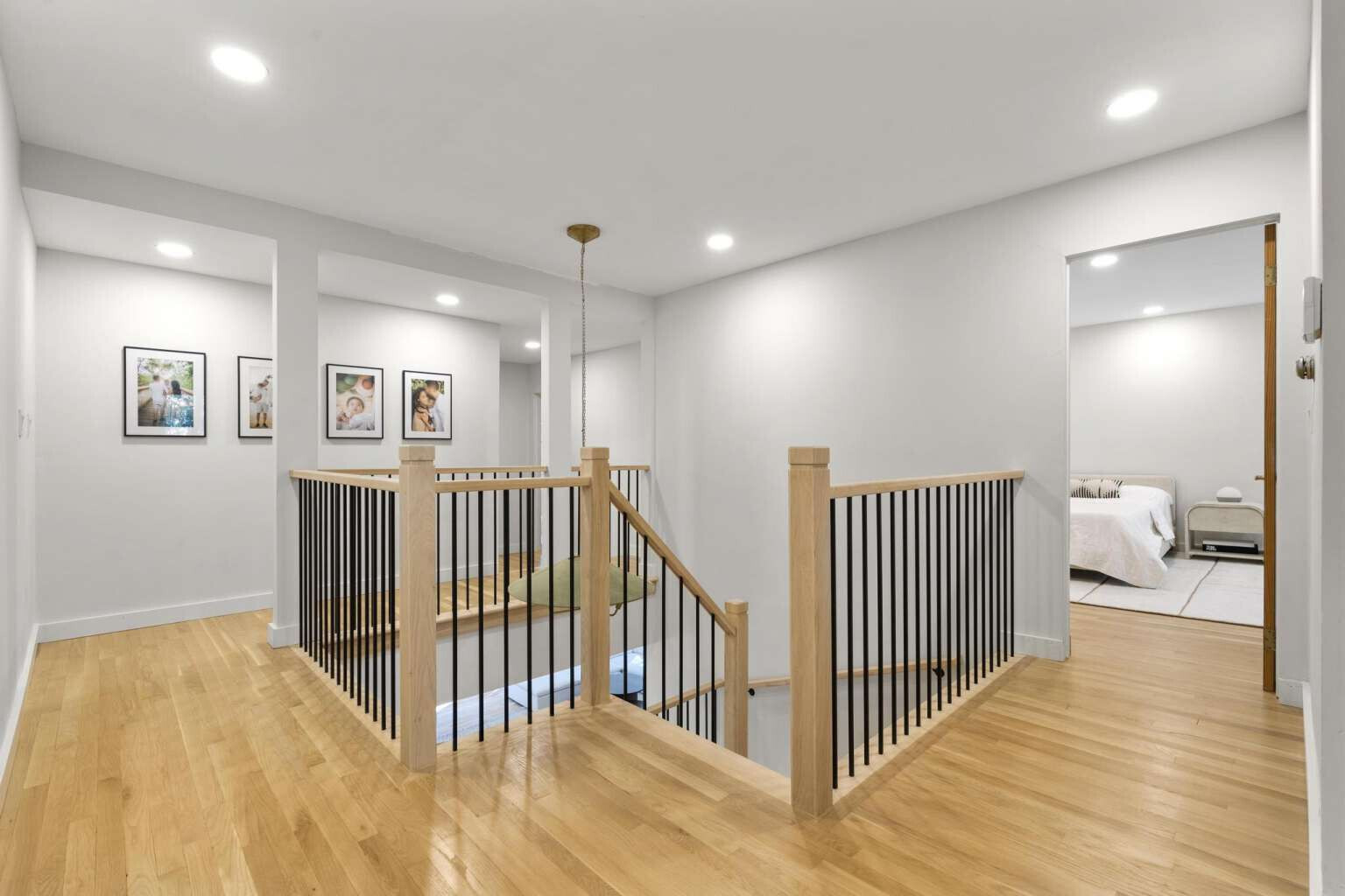 40 Old Quarry Road Woodbridge, CT 06525 - Photo 23 of 39 a view of a hallway with wooden floor and a bathroom
