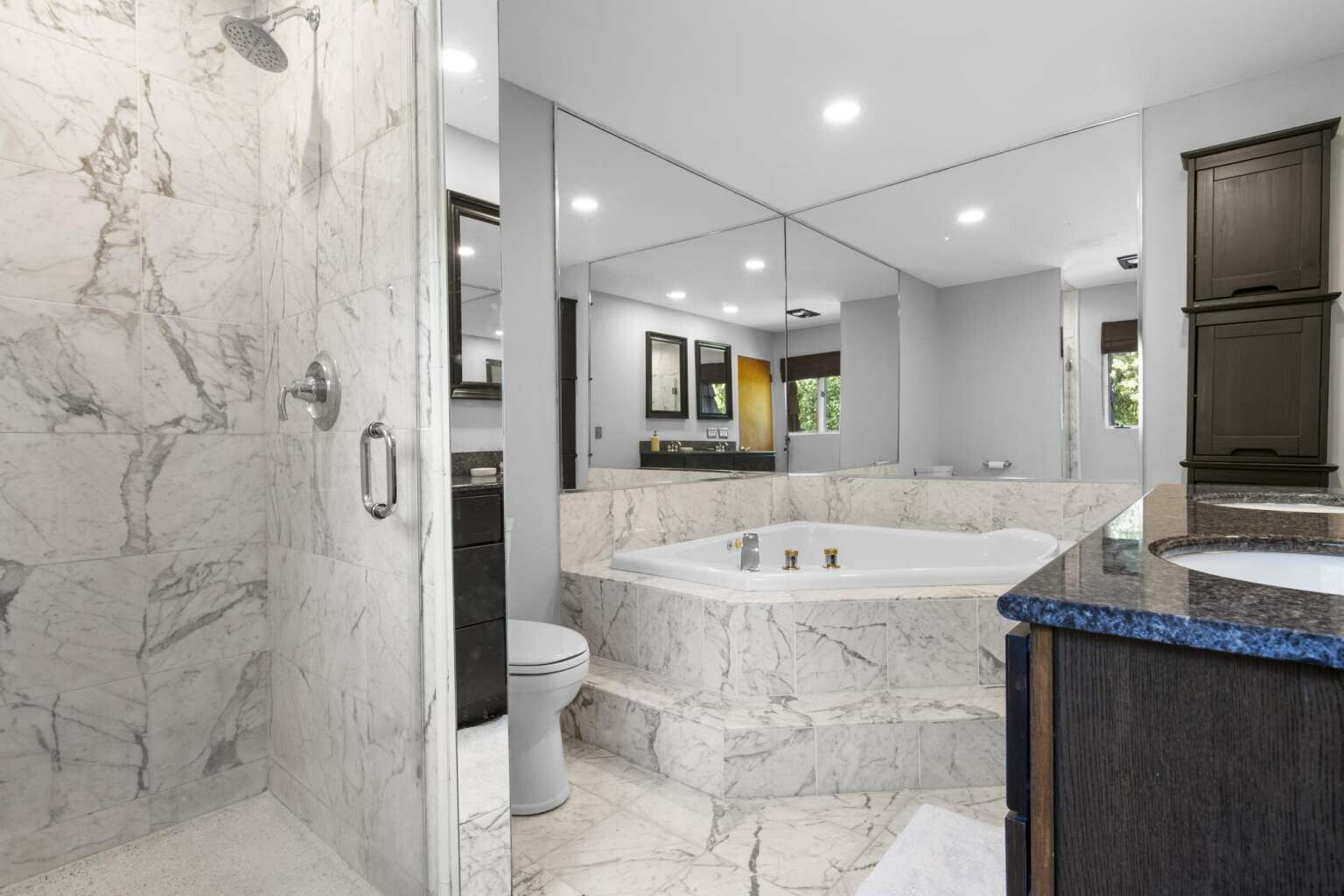 40 Old Quarry Road Woodbridge, CT 06525 - Photo 27 of 39 a spacious bathroom with a granite countertop sink a toilet and shower