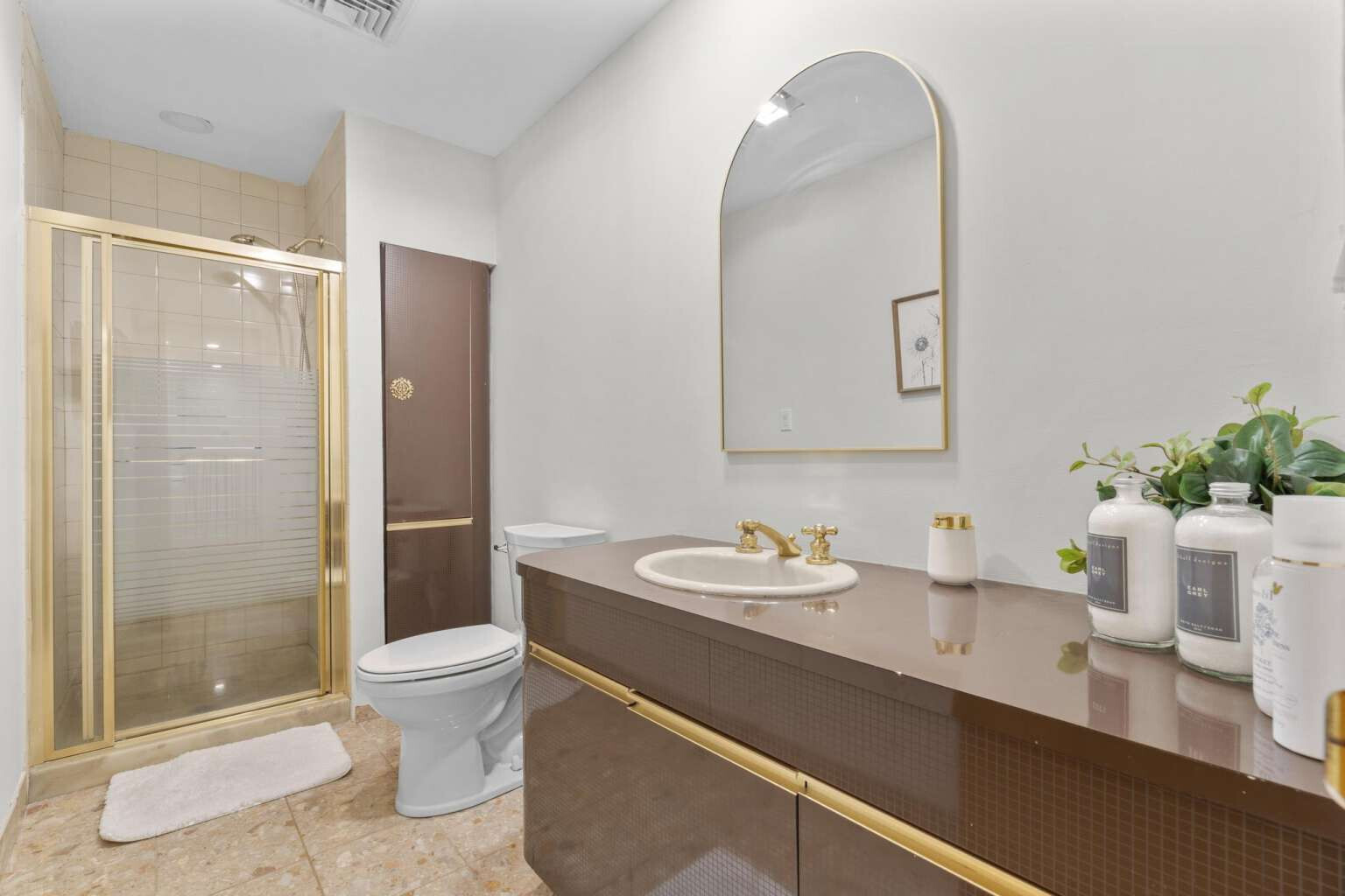 40 Old Quarry Road Woodbridge, CT 06525 - Photo 32 of 39 a bathroom with a double vanity sink toilet and shower