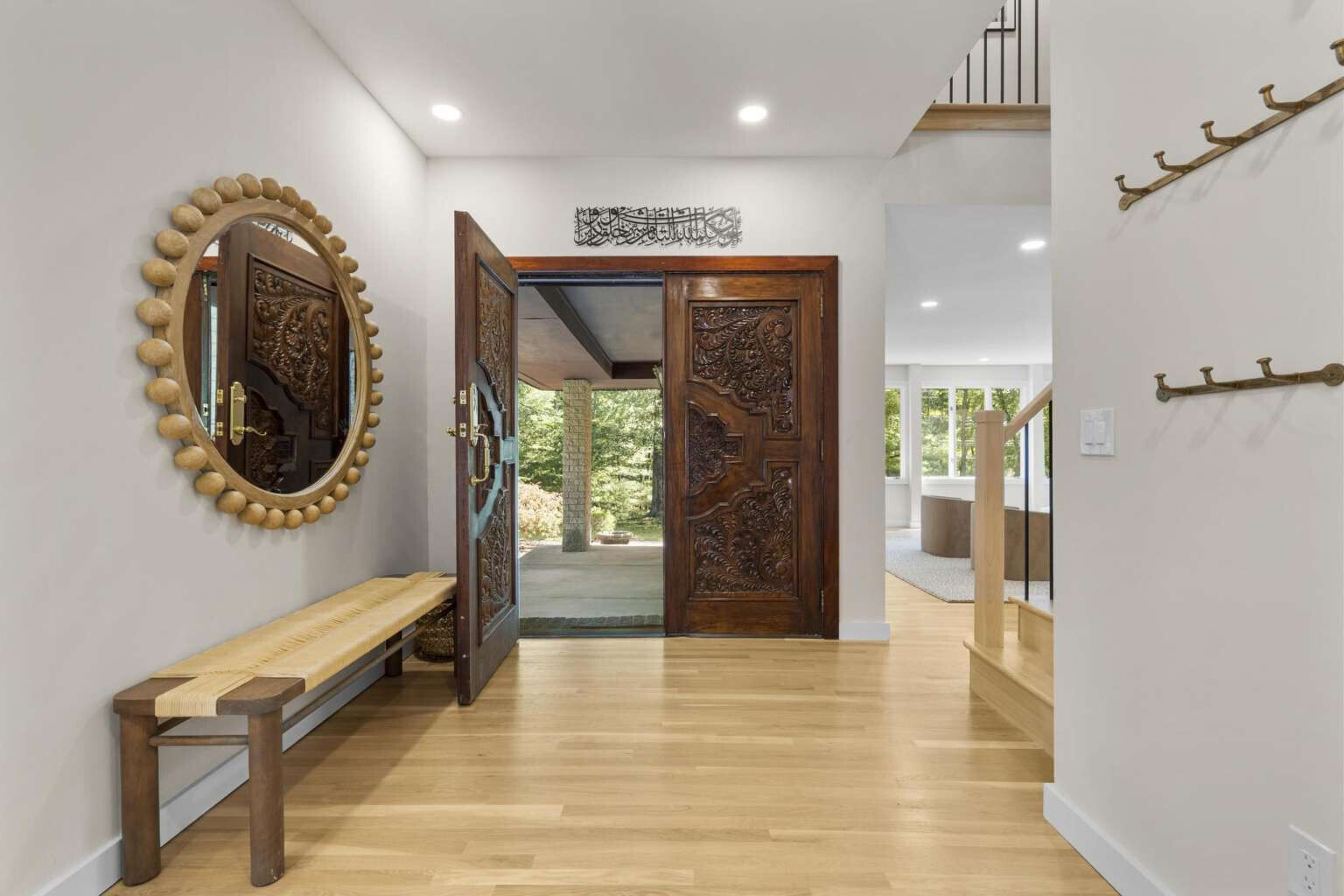 40 Old Quarry Road Woodbridge, CT 06525 - Photo 6 of 39 a hallway with a large mirror in a room