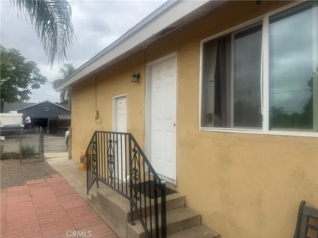 a view of balcony with furniture