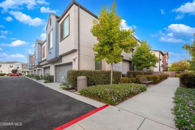 a view of a street with buildings