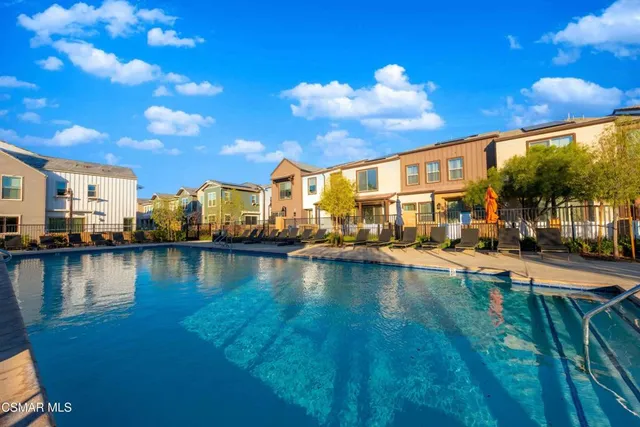 a childrens park with lots of swings and slides