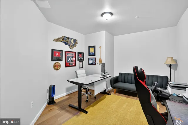 a view of a workspace with furniture