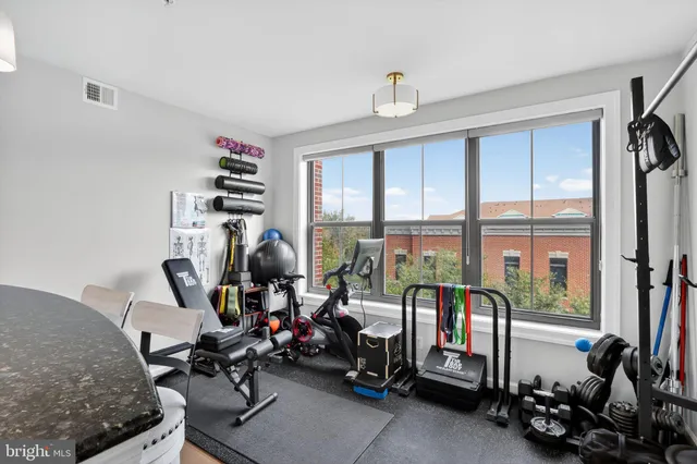 a view of a workspace with gym equipment
