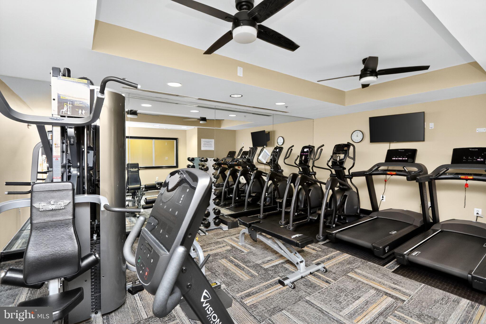 485 Harbor Side Street, Unit 407 Woodbridge, VA 22191 - Photo 32 of 47 Modern fitness center with diverse equipment.