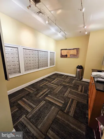 a view of a street with cars on the road