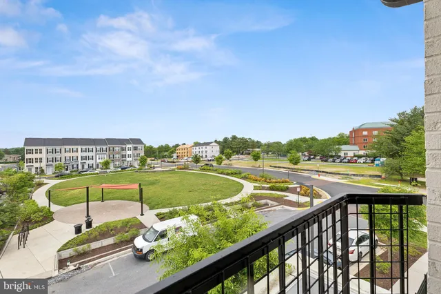 a view of swimming pool from a balcony