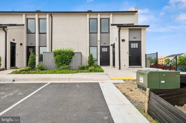 a view of a house with a garden