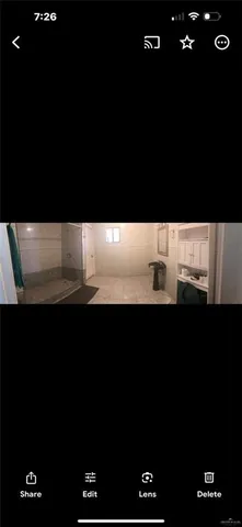 a view of entryway with lots of an empty room