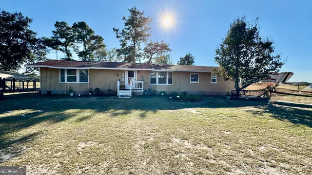 a view of a house with swimming pool