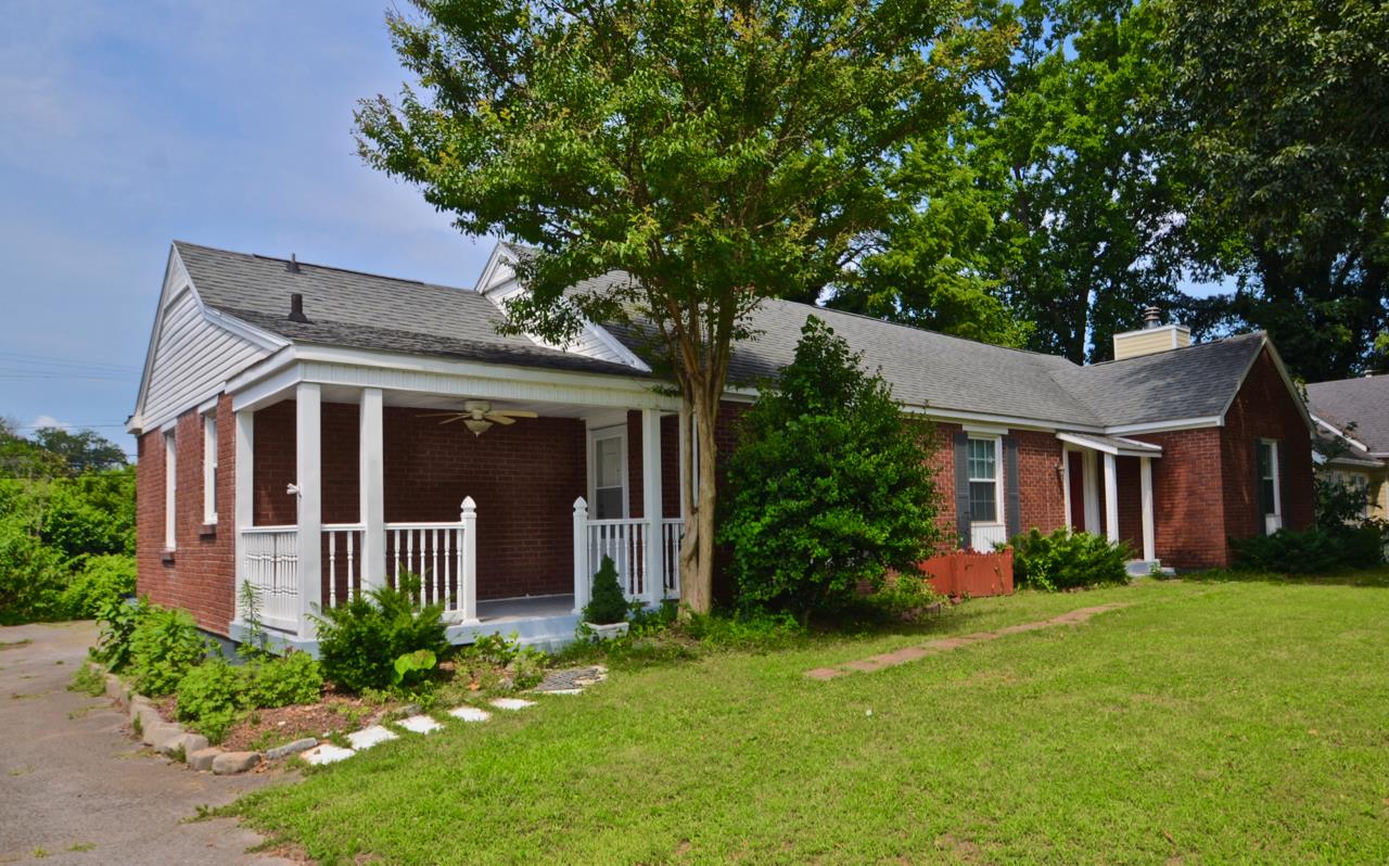 207 Cherokee Road Nashville, TN 37205 - Photo 1 of 24 front view of a house with a yard